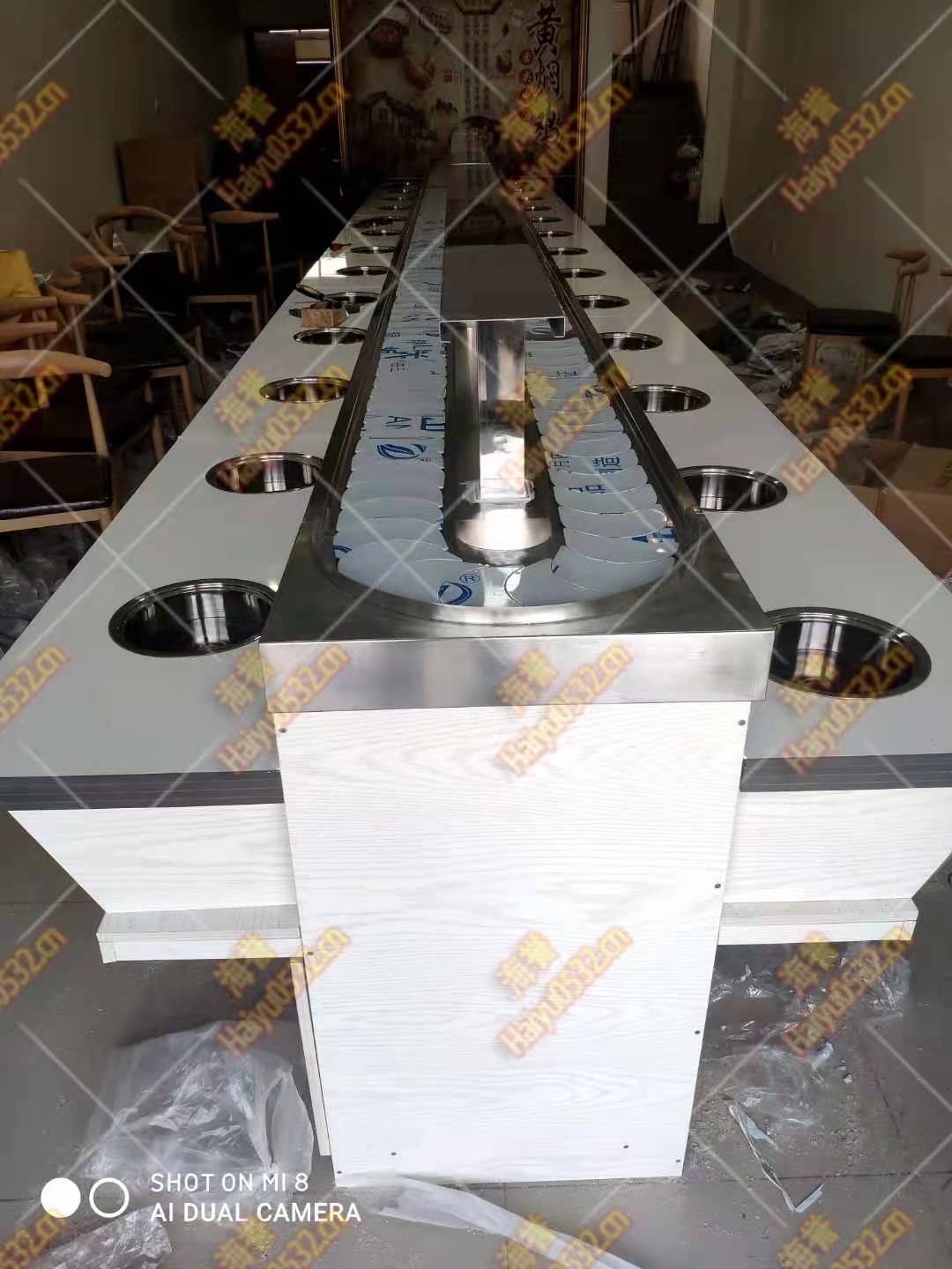 旋轉(zhuǎn)小火鍋機器多少錢一臺