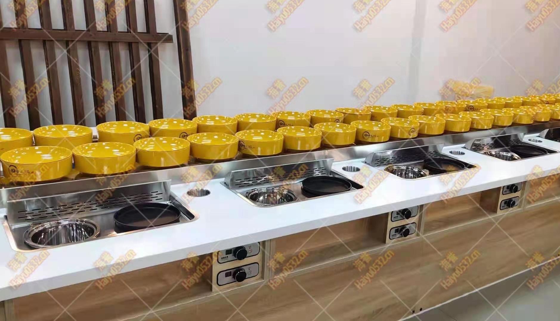 旋轉(zhuǎn)小火鍋機器多少錢一臺