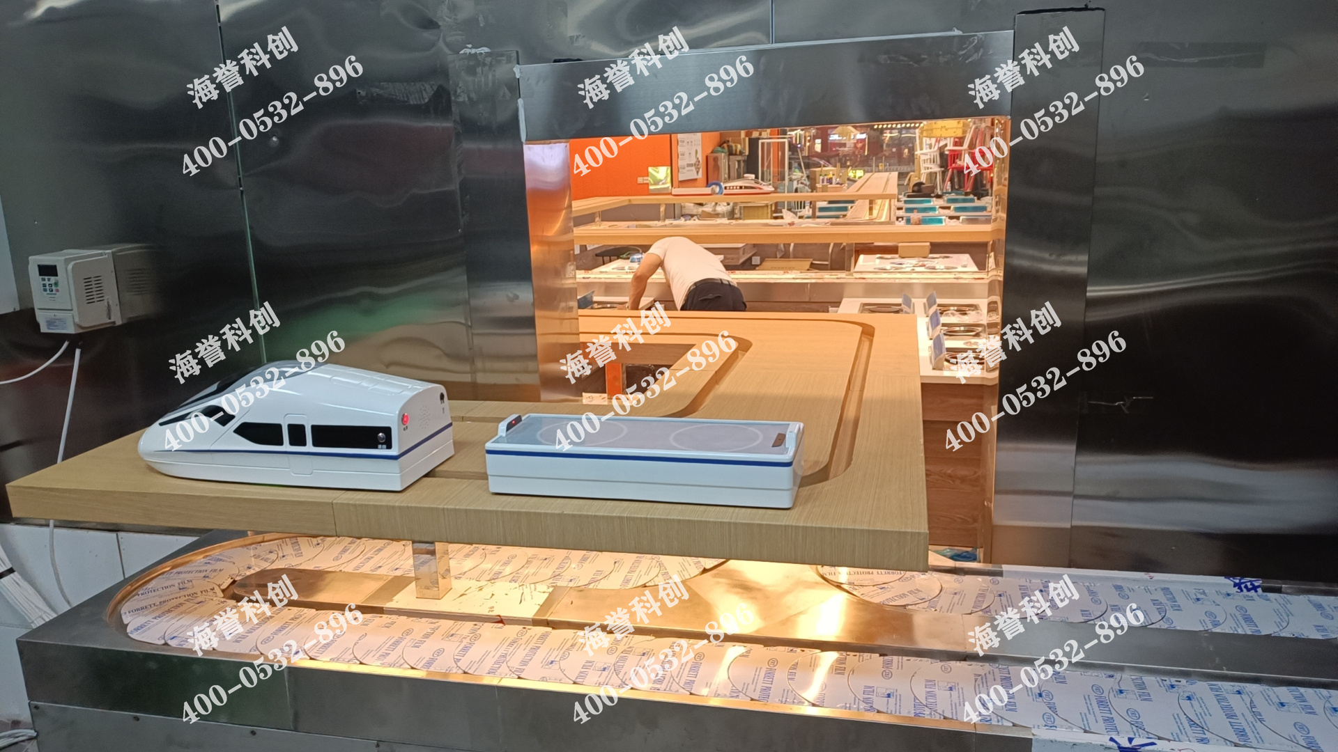 海譽(yù)科創(chuàng)河南安陽涮烤一體小火鍋搭載智能送餐小火車安裝完成