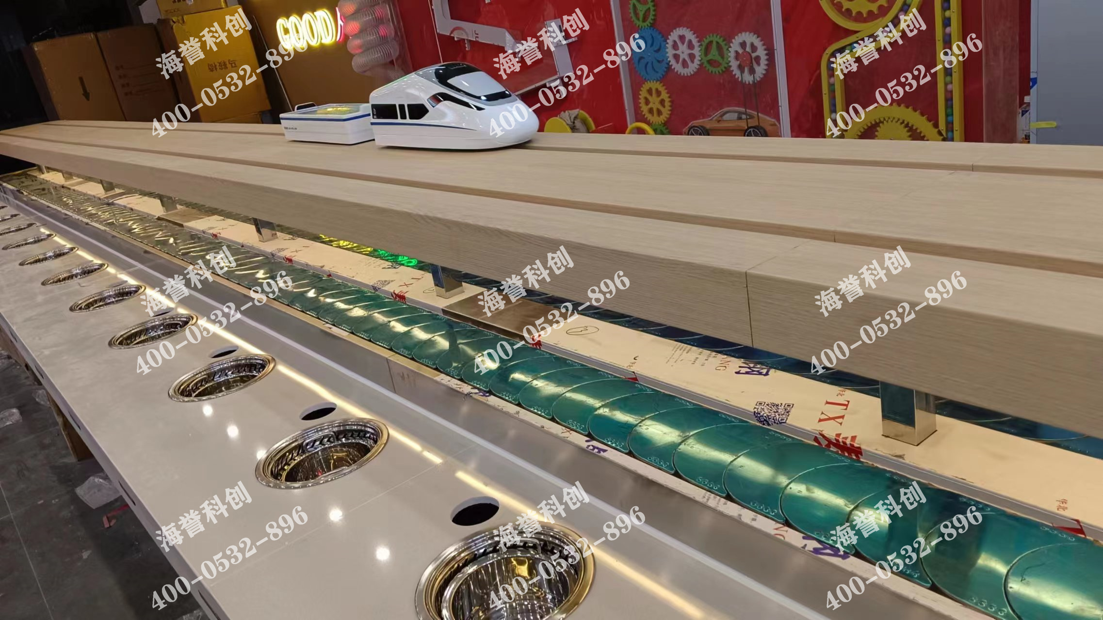 海譽(yù)科創(chuàng)河南鶴壁單涮無煙小火鍋設(shè)備搭載智能送餐小火車安裝完成